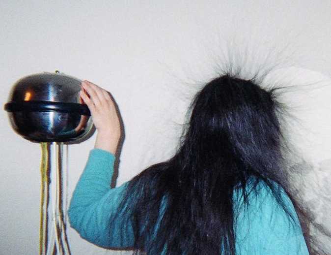 My van de Graaff generator in action. Uses inexpensive driveway markers to reduce surface area of column instead of conventional, expensive acrylic tube.